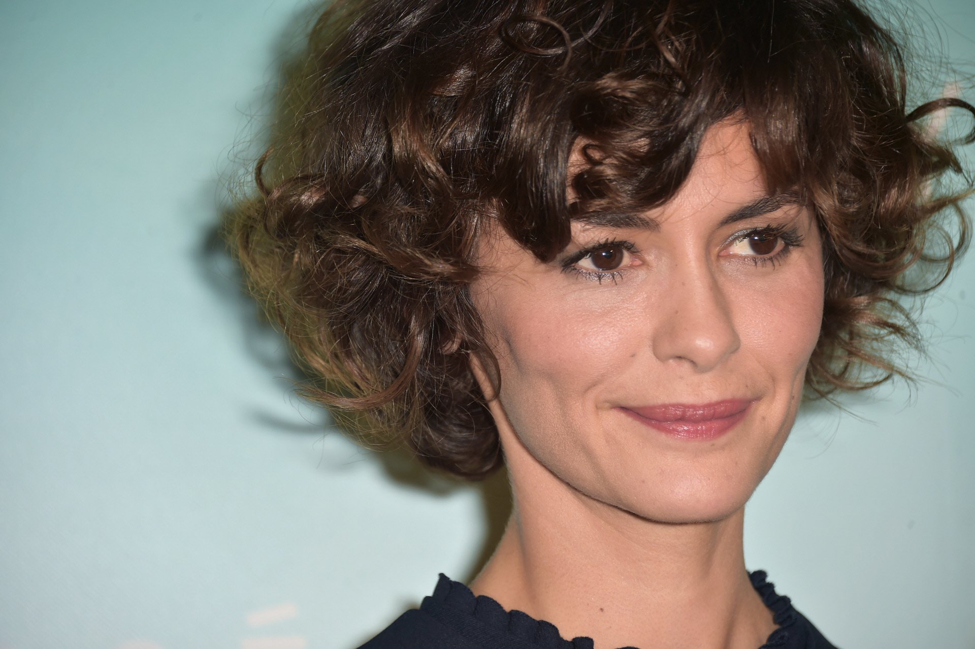 Audrey Tautou with a curly pixie.