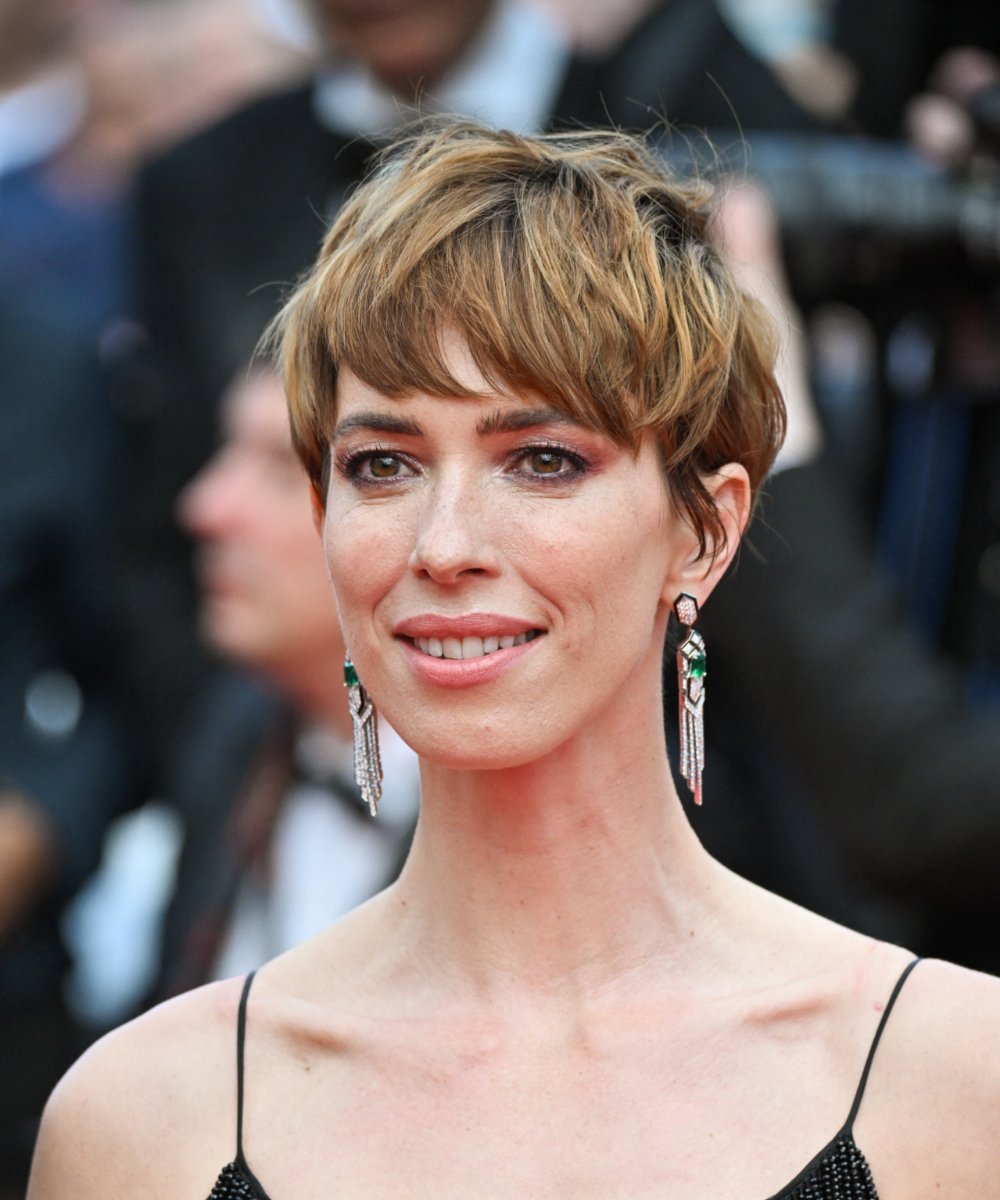 Rebecca Hall in a long pixie with long sideburns.