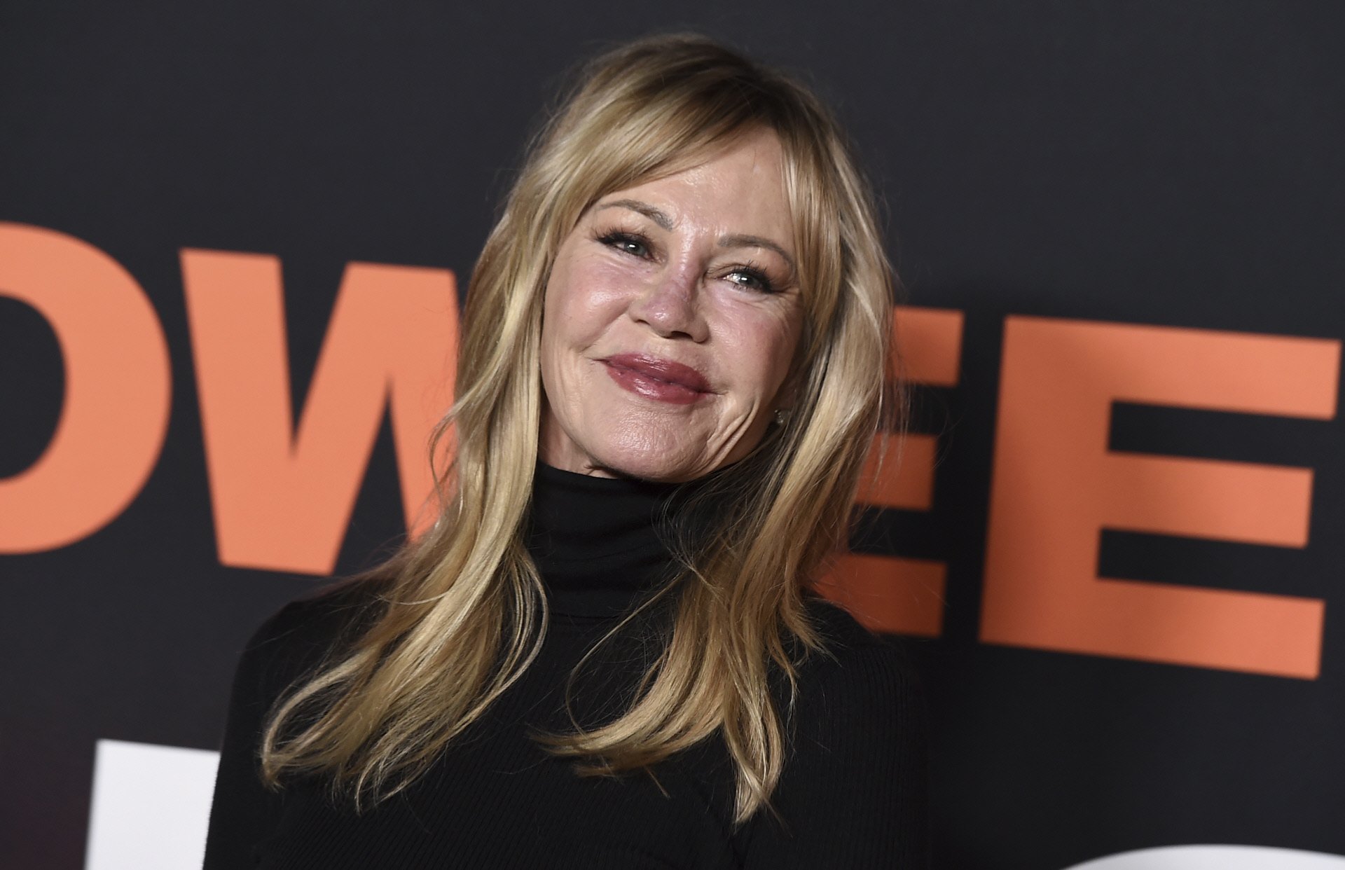 Melanie Griffith in her flattering new layered haircut at the premiere of Halloween Ends in Los 