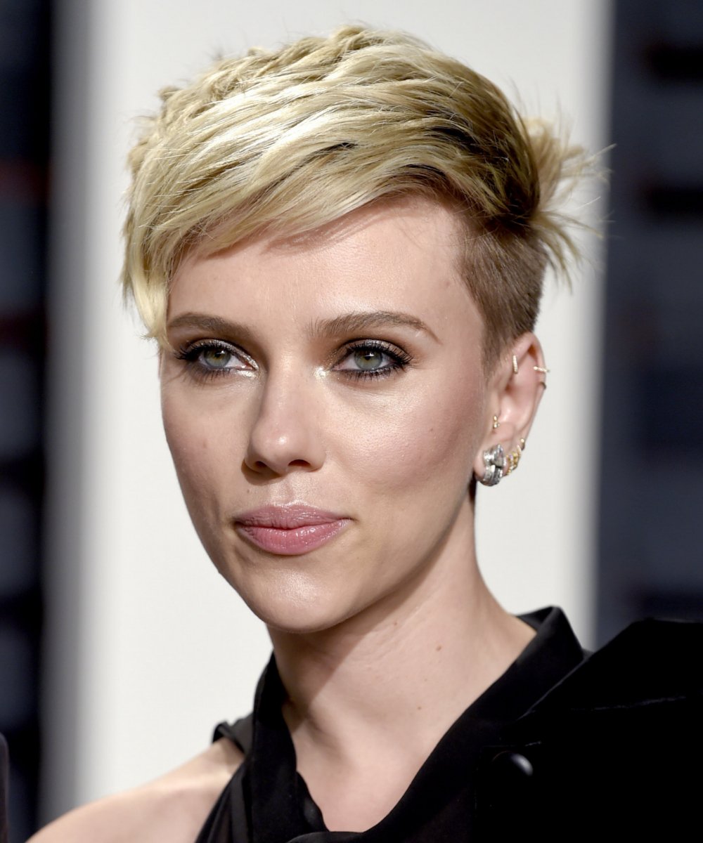 Scarlett Johansson with a tousled pixie haircut.