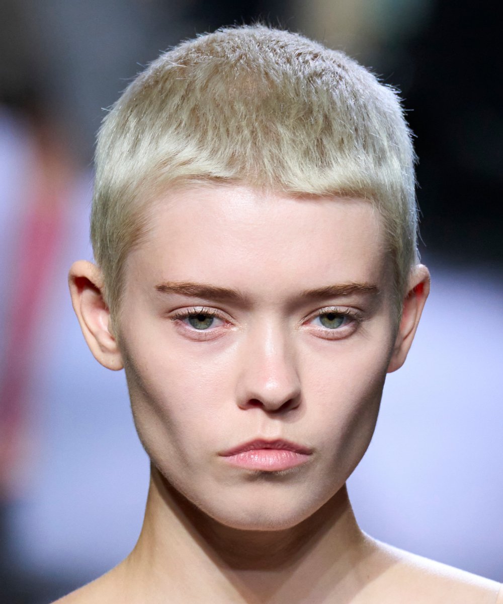 A buzz cut or shaved hair to the four of the Miu Miu parade for the pr