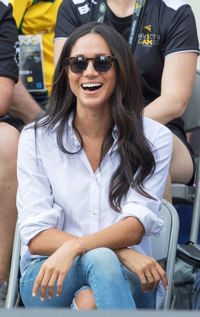Ultimate Guide to Royal Christmas Gifts - Princess Kate's Go-To Gloves, Meghan Markle's Signature Sunglasses and More!  400 Prince Harry.  Invictus Games 2017: Picture Mark Large.... 9/25/17 Prince Harry attends wheelchair tennis with girlfriend Meghan Markle at Nathan Phillips Square Toronto.