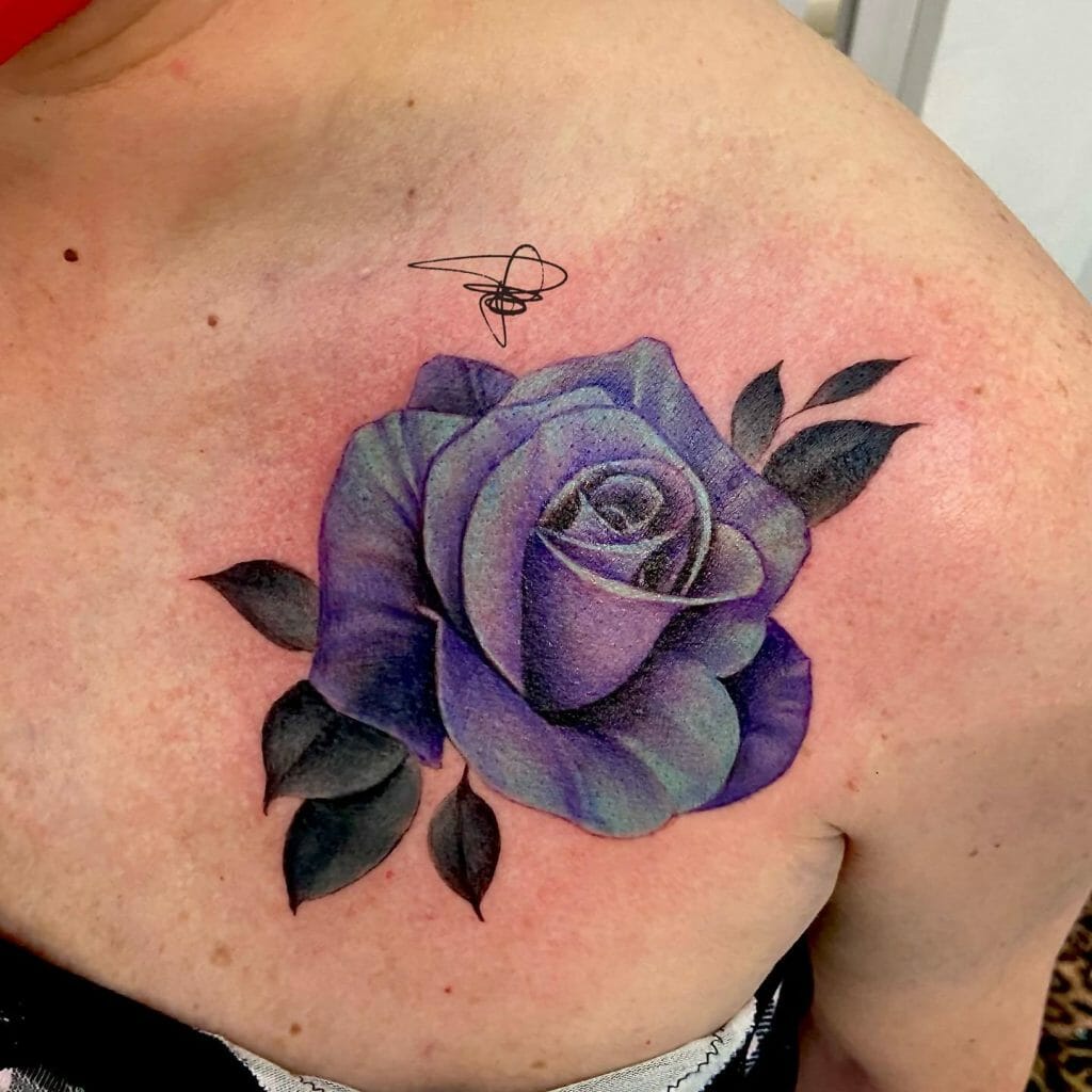 Realistic rose tattoo on chest