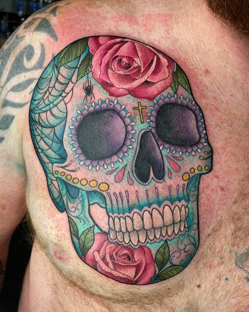 Chest rose and skull tattoo