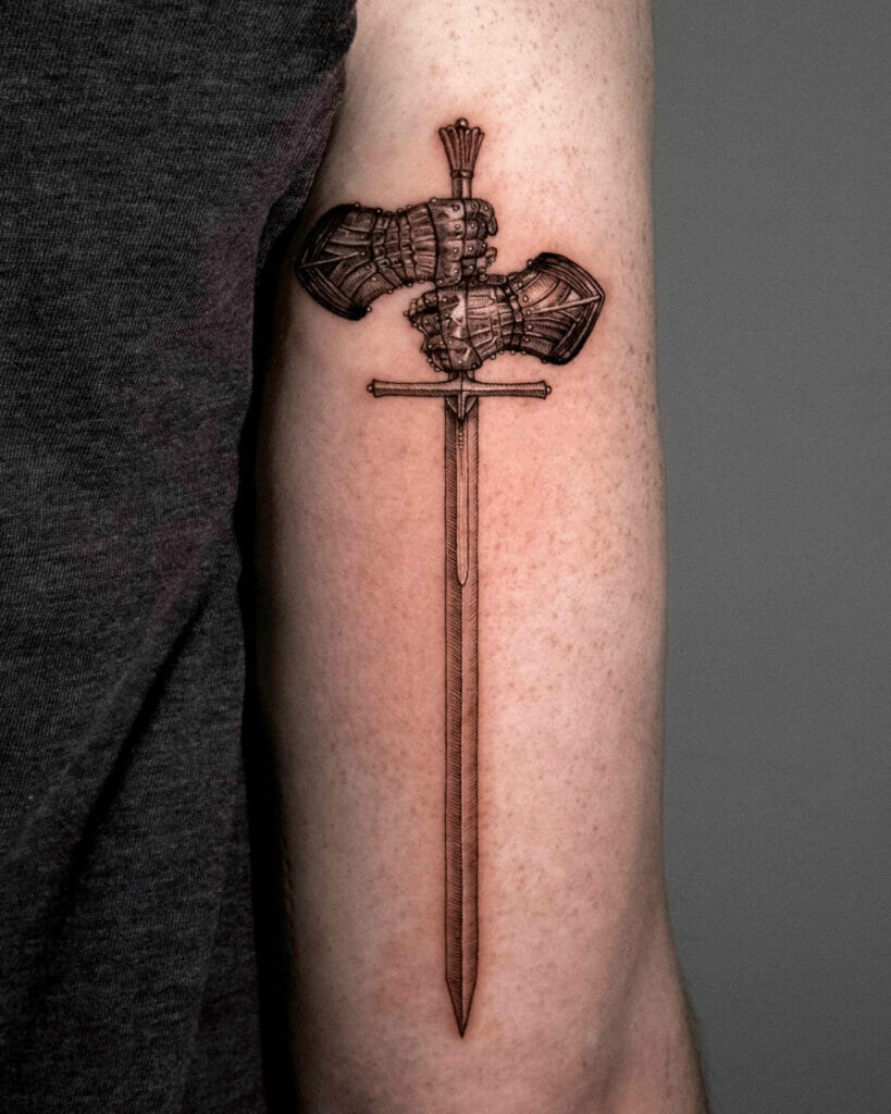 Armor Hands Holding Sword Tattoo