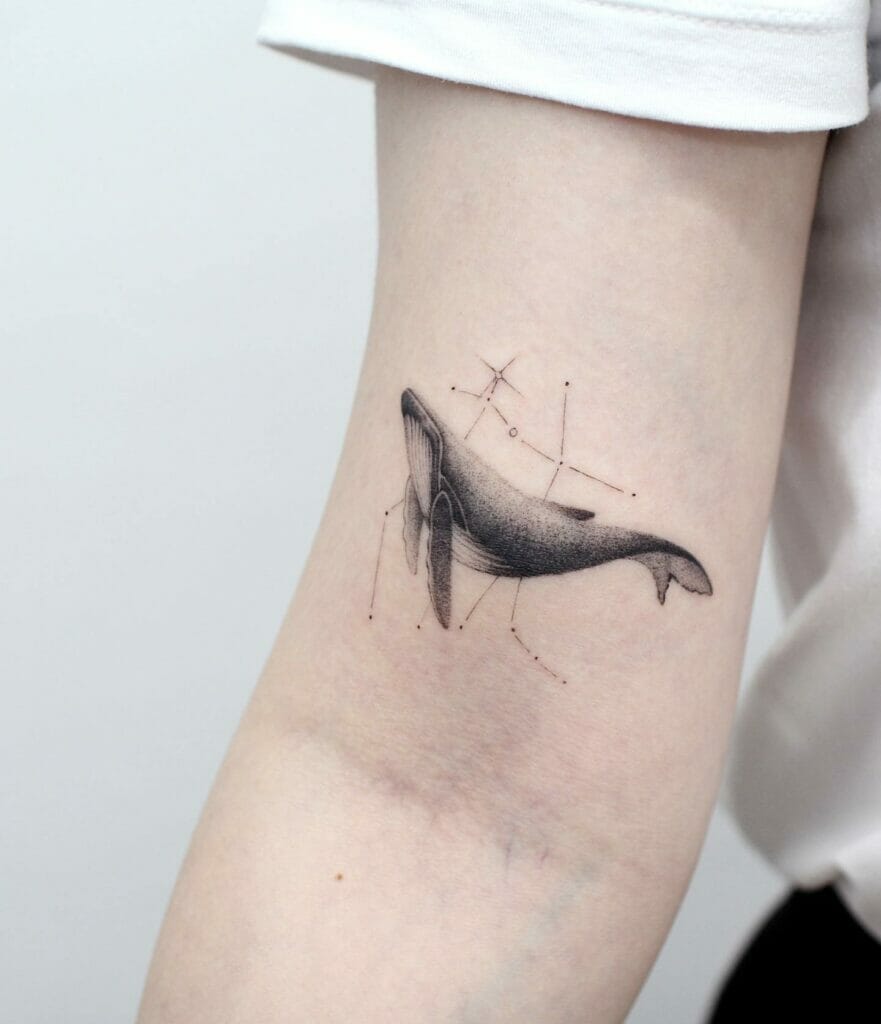 The cute whale and gemini tattoo of strength and calm