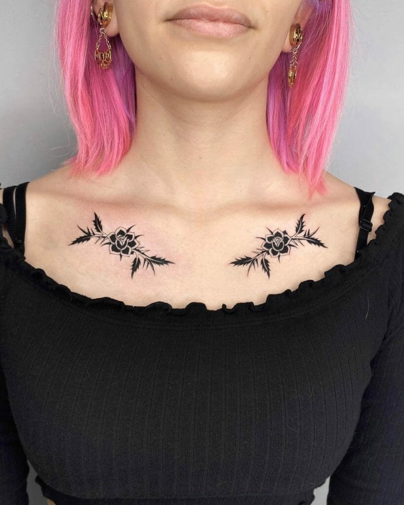 Rose on chest tattoo with thorns