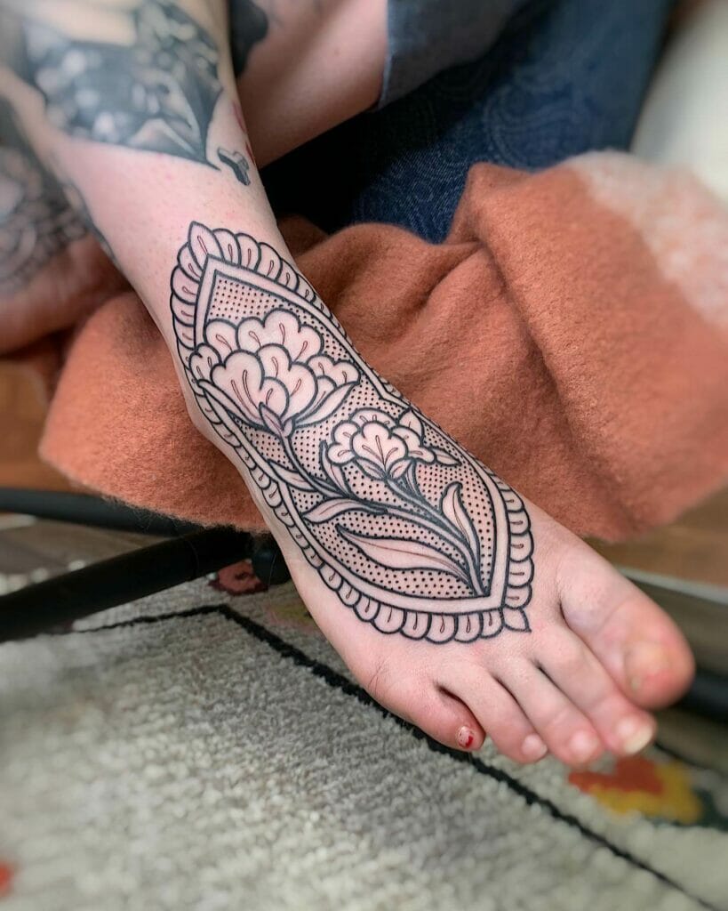 Tribal beautiful floral tattoo on ankle