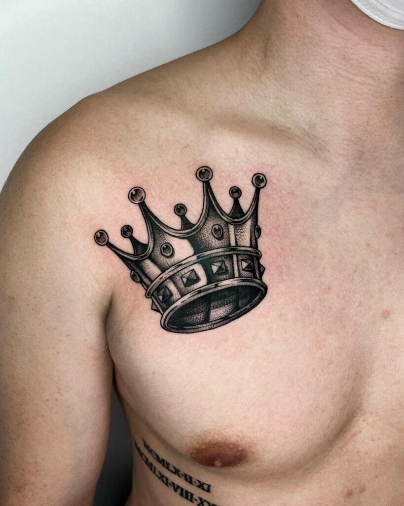 A monochrome king crown tattoo