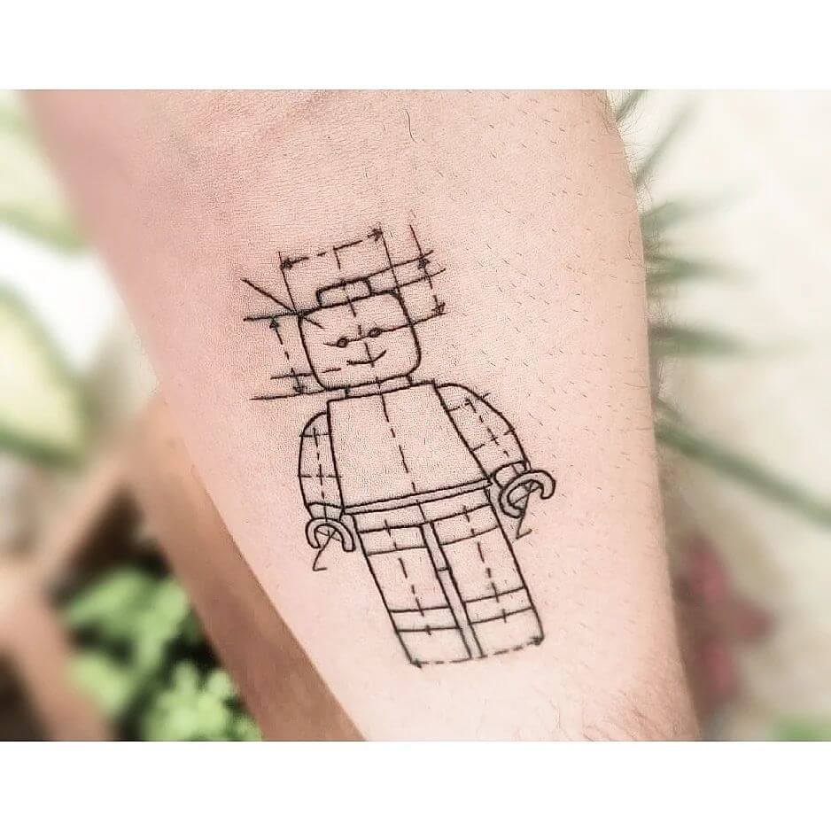 Nice schematic lego tattoo on hand