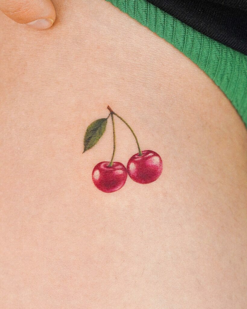 Bikini line tattoos with cherry