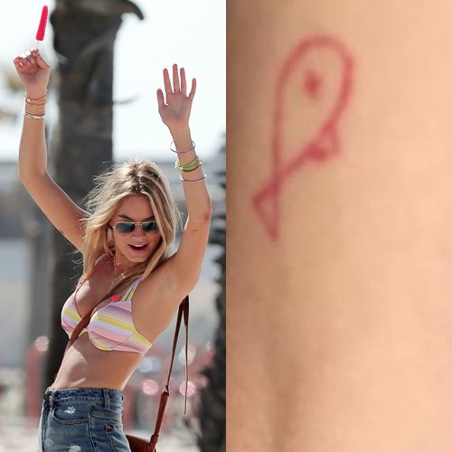 Camille Rowe Fish Tattoo on Arm