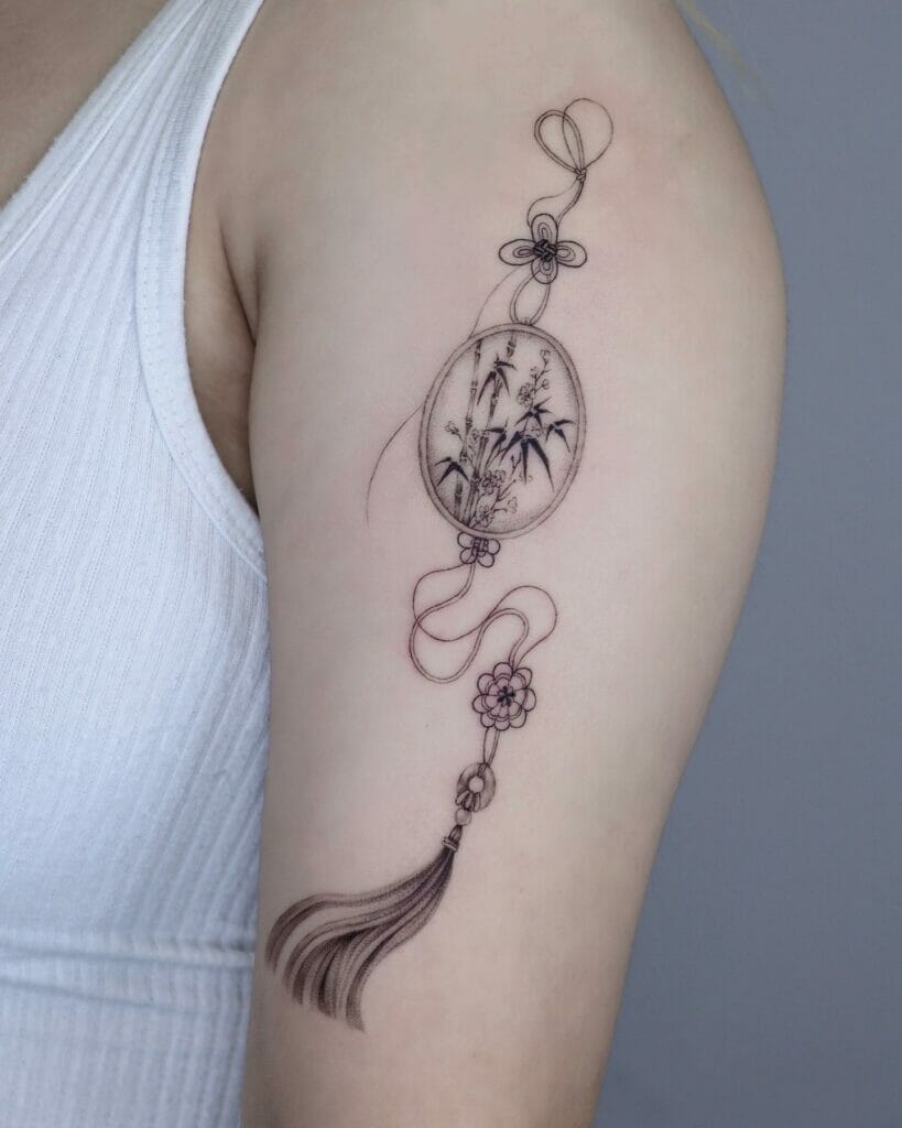 Chinese knot tattoo with beautiful bamboo and cherry blossom