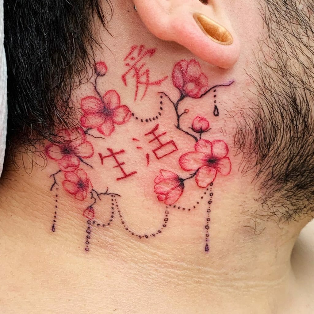 Chinese symbol tattoo with flowers behind the ear