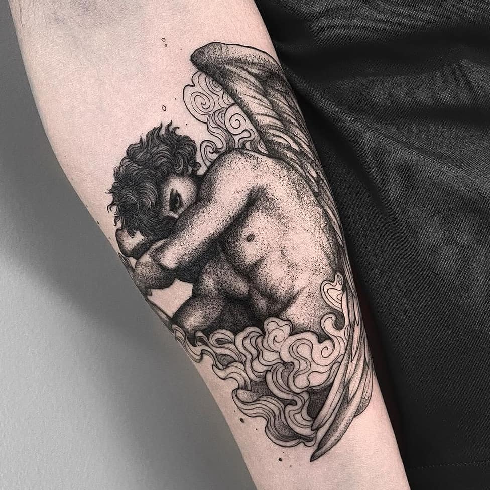 Fallen angel tattoo on forearm