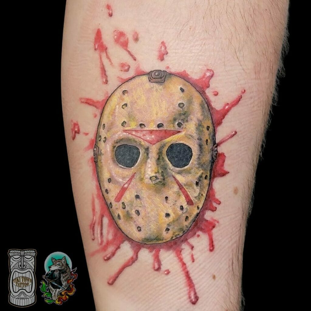 Jason's hockey mask with blood tattoo