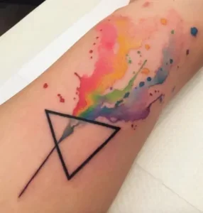 Lesbian tattoo triangle with rainbow colors