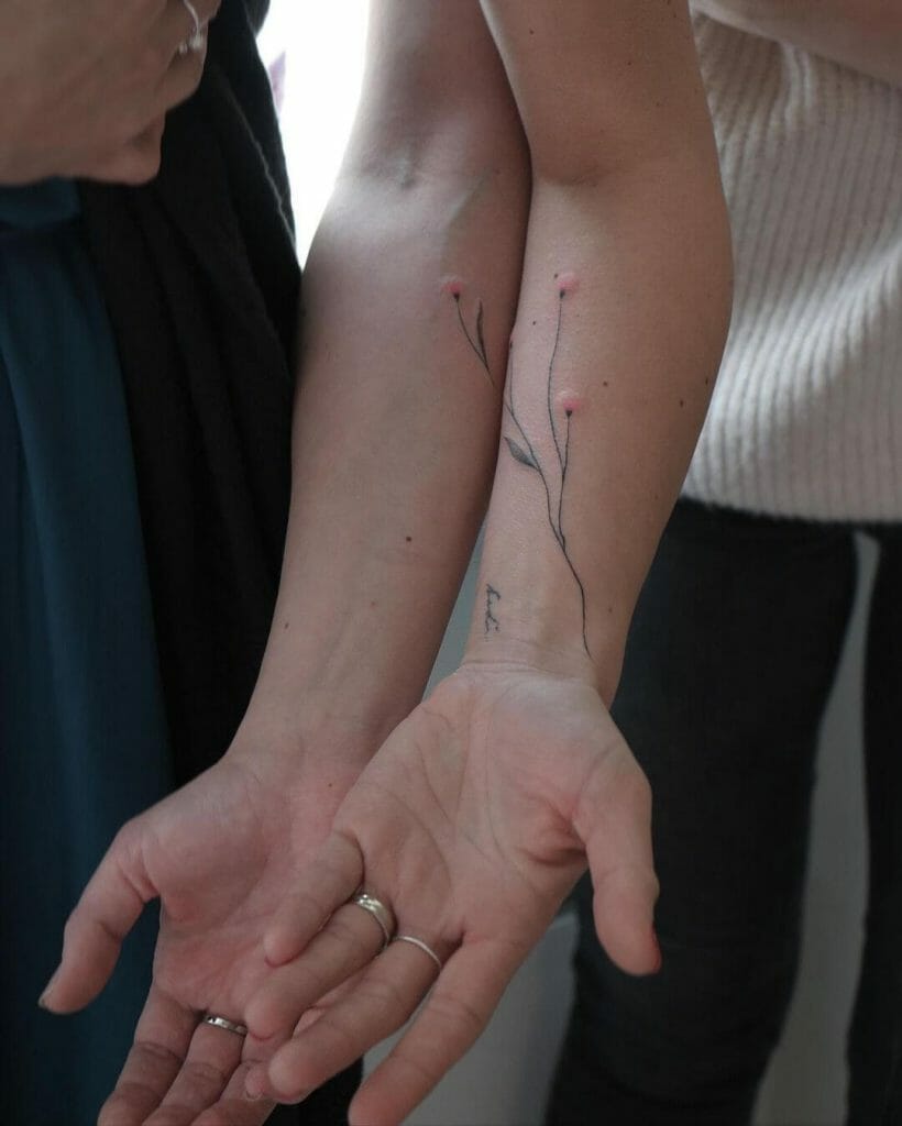 Matching couple tattoo with colorful details