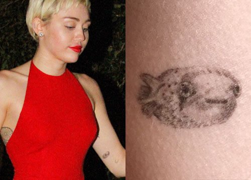 Miley Cyrus Fish Symbol on Wrist