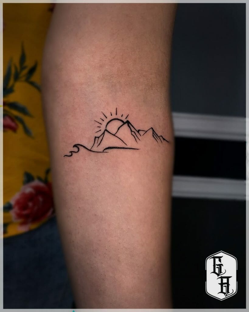 Minimalist wavy mountain tattoo