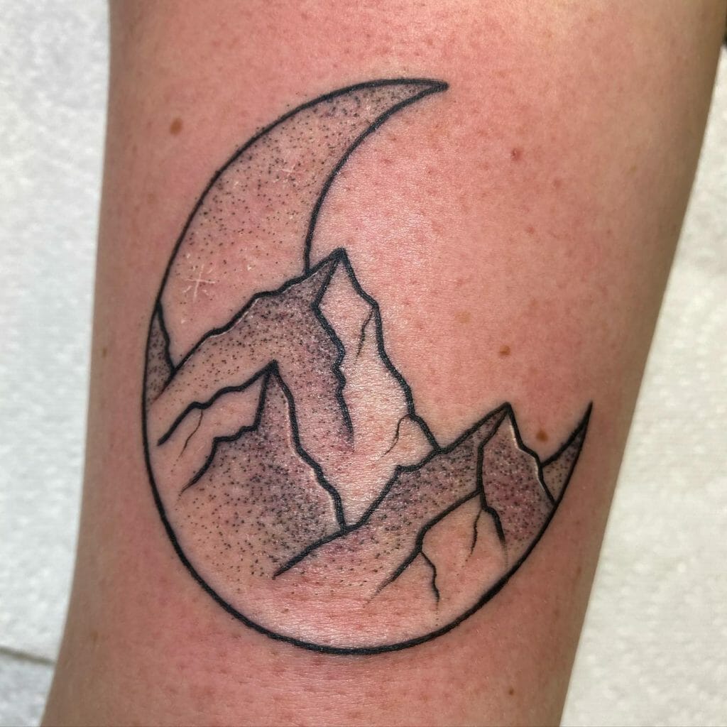 Moon and mountain tattoo