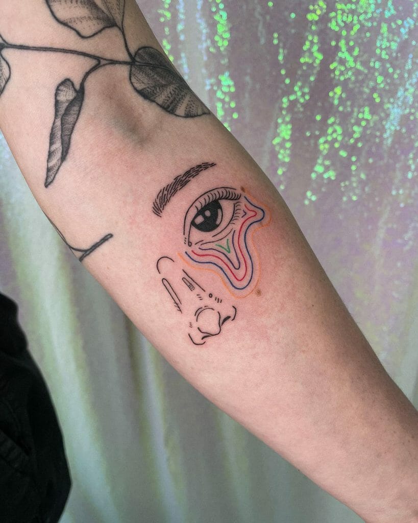 Realistic eye tattoo on arm