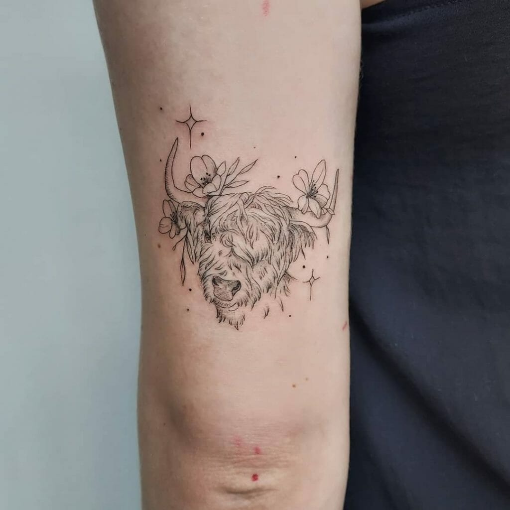 Scottish cow tattoo