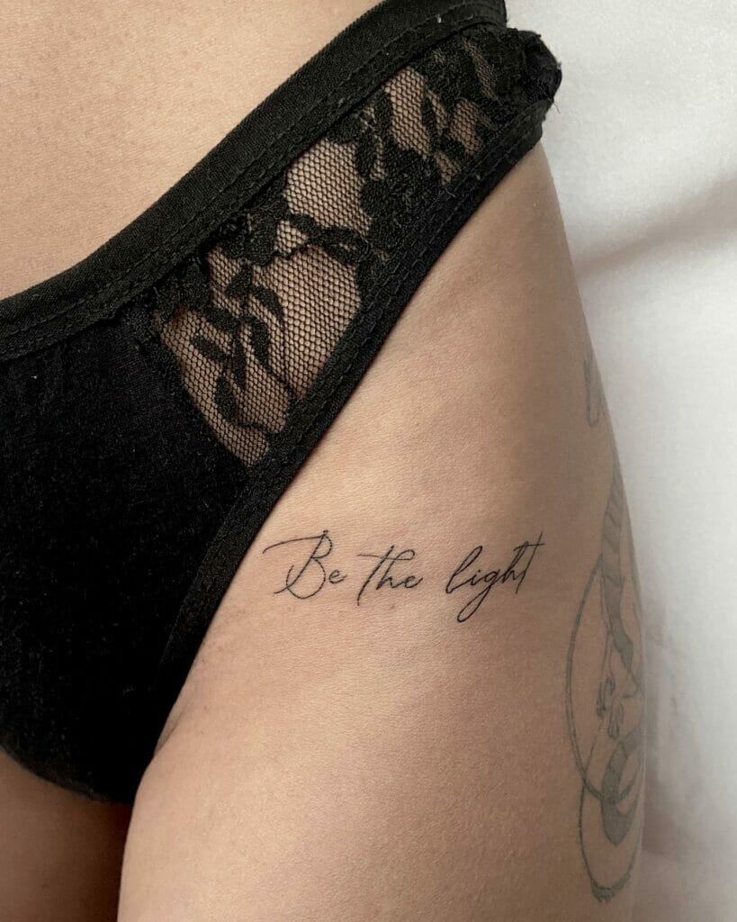 Simple bikini line tattoos with quote