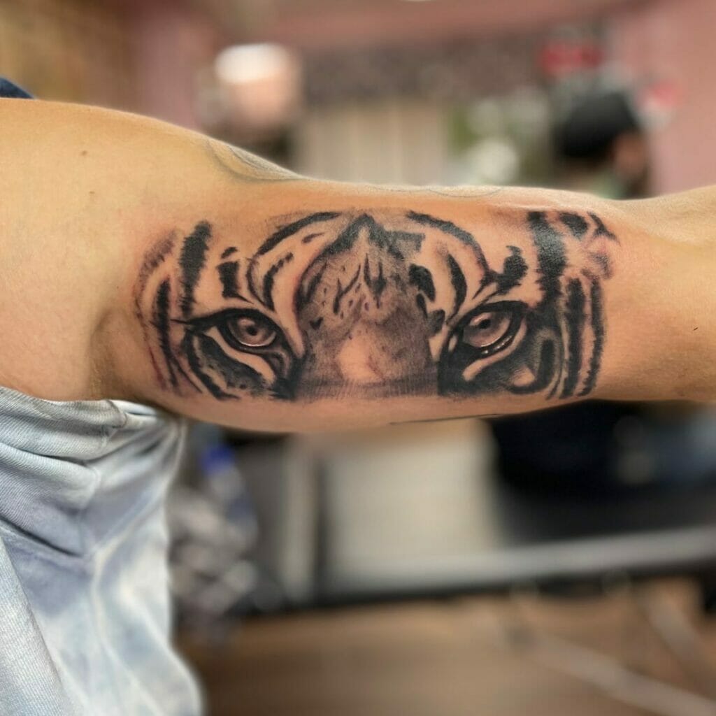 Simple tiger eye tattoo