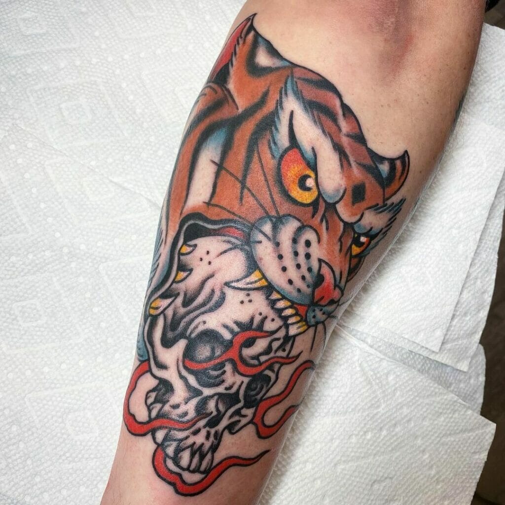 Skull and traditional tiger tattoo