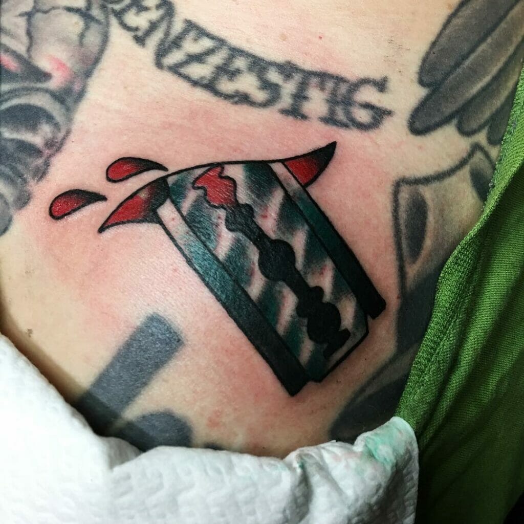 Slit skin razor blade and blood tattoo 