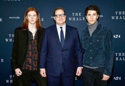 Actor Brendan Fraser, center, poses with his sons Leland Fraser, left, and Holden Fraser at the premiere of "The whale" at Alice Tully Hall, in New York NY Premiere of "The whale"New York, United States – November 29, 2022