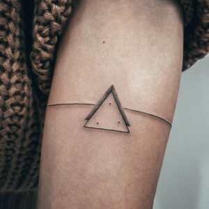 distinctive female triangle tattoo designs