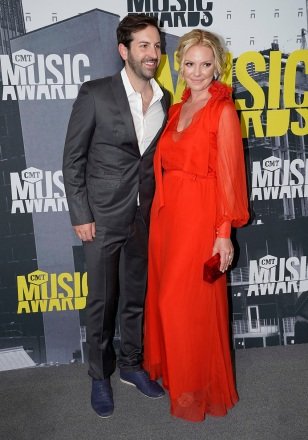 Josh Kelley, left, and Katherine Heigl arrive at the CMT Music Awards at the Music City Center in Nashville, Tenn 2017 CMT Music Awards - Arrivals, Nashville, U.S. - June 7, 2017