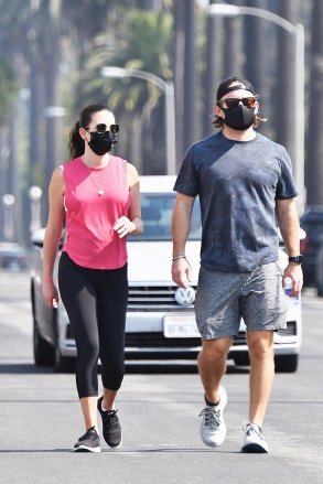 Brentwood, CA - *EXCLUSIVE* - New parents Lea Michele and Zandy Reich stay in shape as they power walk together on Saturday.  Pictured: Lea Michele, Zandy Reich Contains children Please pixelate face prior to publication*