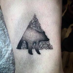 mens dotted wild animal in triangle tattoo on arms