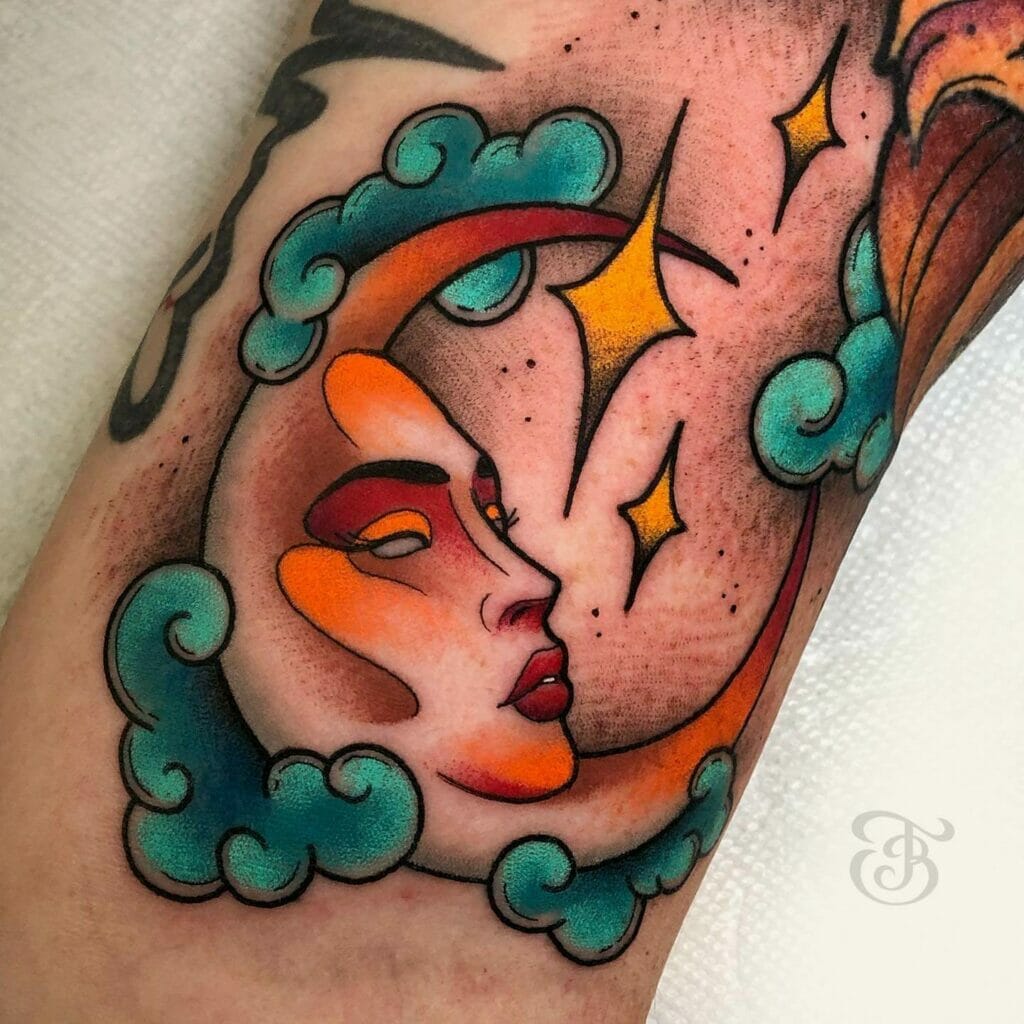 Stars and clouds tattoo with a moon face