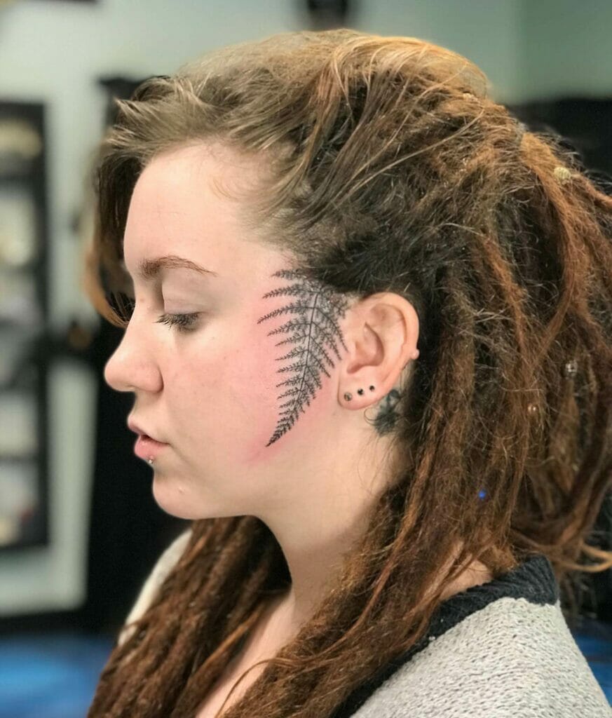 "side fern" Sideburns face tattoo woman