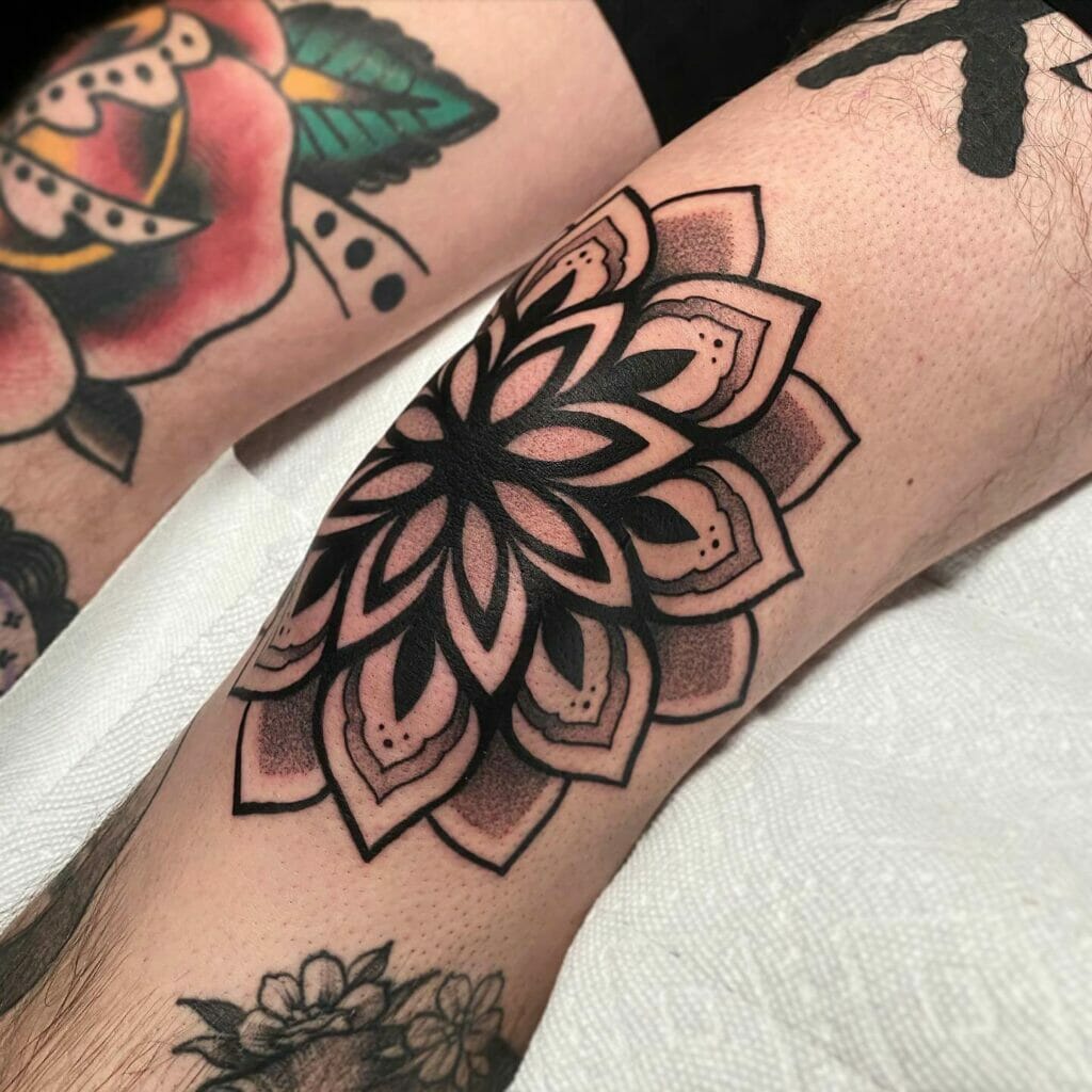 Wonderful small mandala tattoo with gray undertones