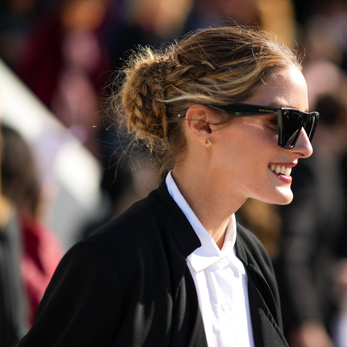 Olivia Palermo with an updo with braids.