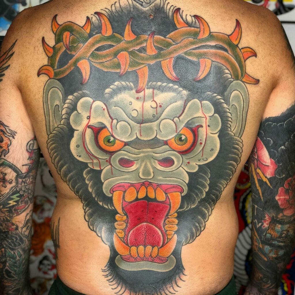 Blue and Red Black Magic Monster Tattoo