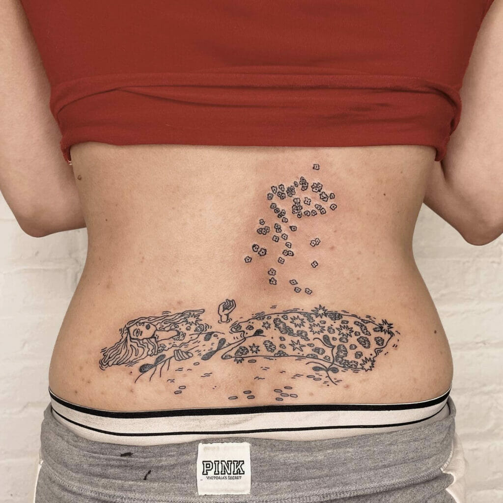 Tramp Stamps tattoo on lower back