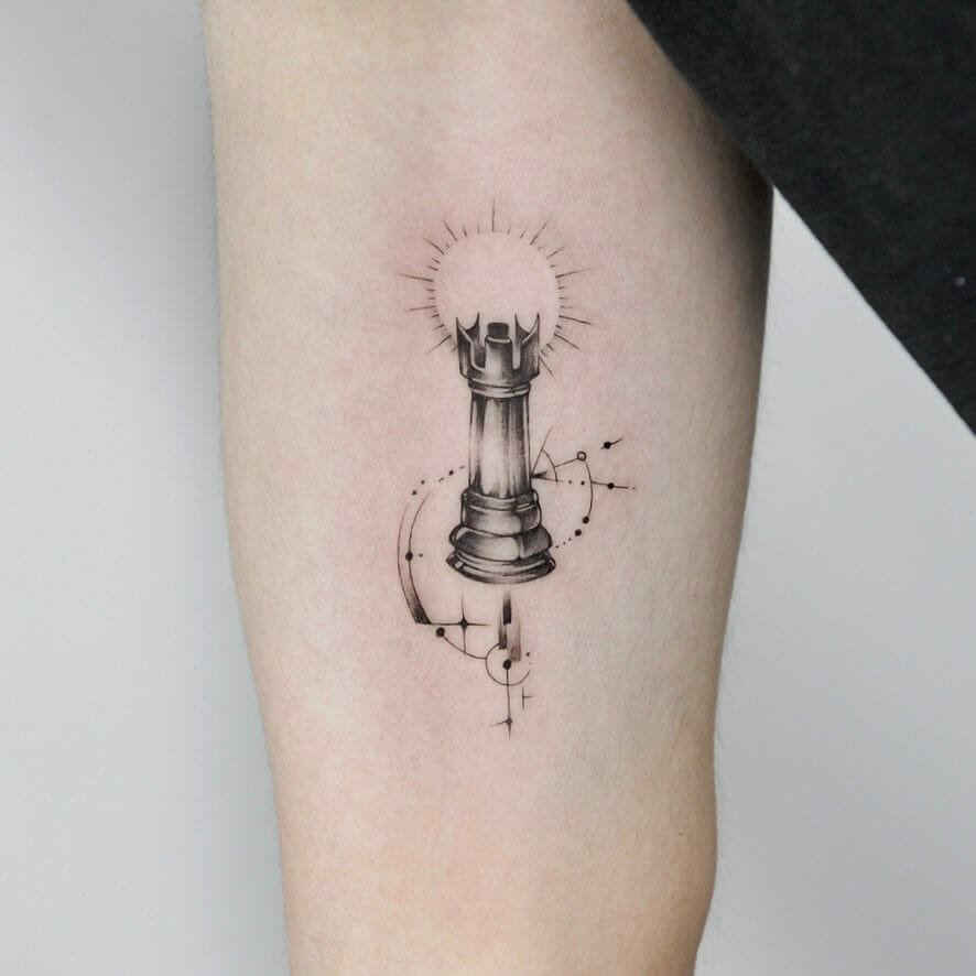 Stylish Rook Piece Tattoo Designs for Upper Right Elbow