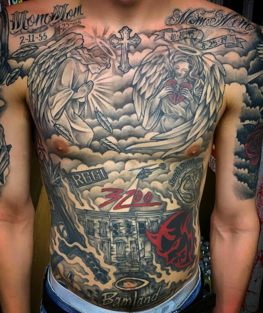 Massive cross with clouds tattoo on chest and stomach