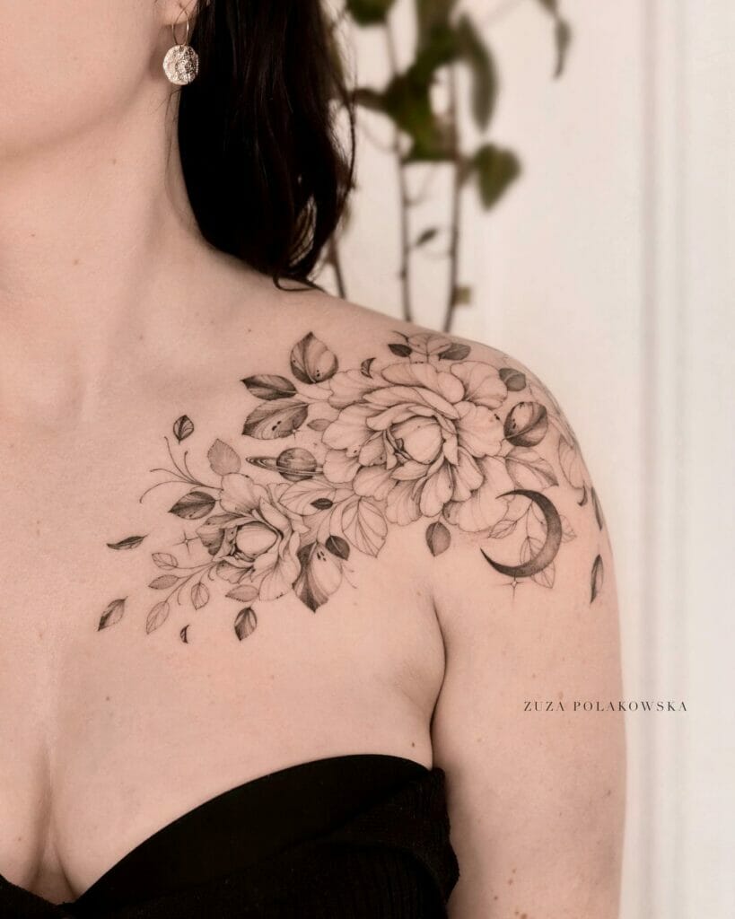 Heavily shaded black and gray floral collarbone tattoo designs