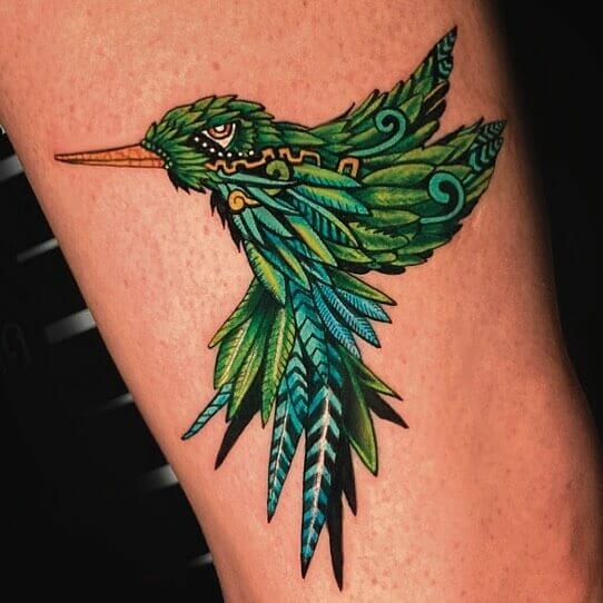 Awesome abstract hummingbird tattoo design for men