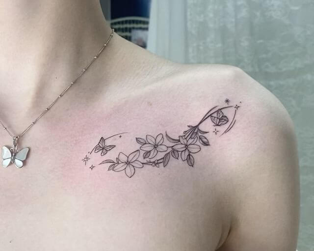 Stunning floral collarbone tattoos with other symbols and objects