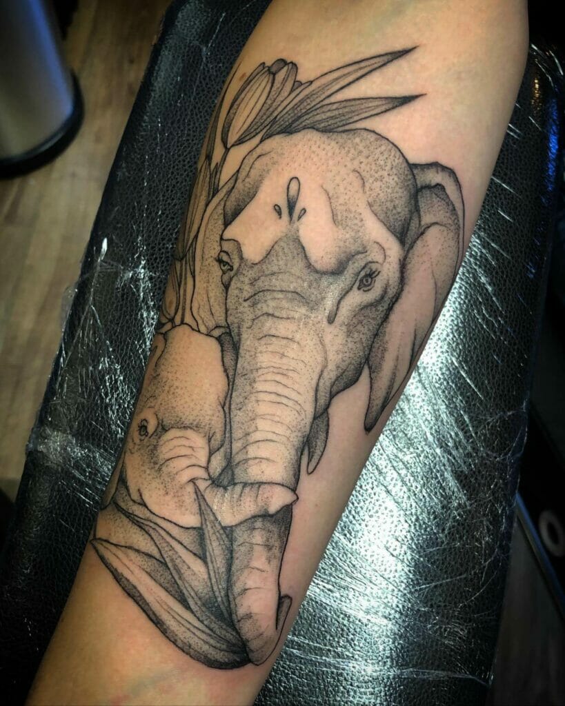 The elephant tattoo design intertwined with trunks