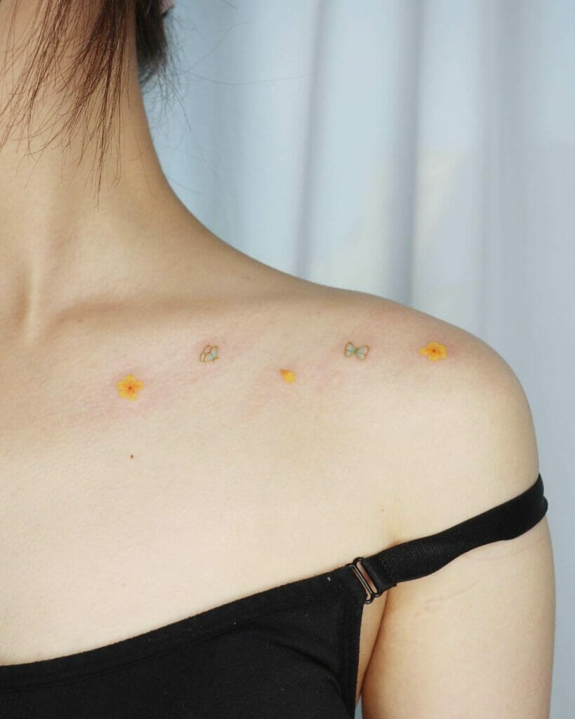 Minimal and simple floral collarbone tattoos
