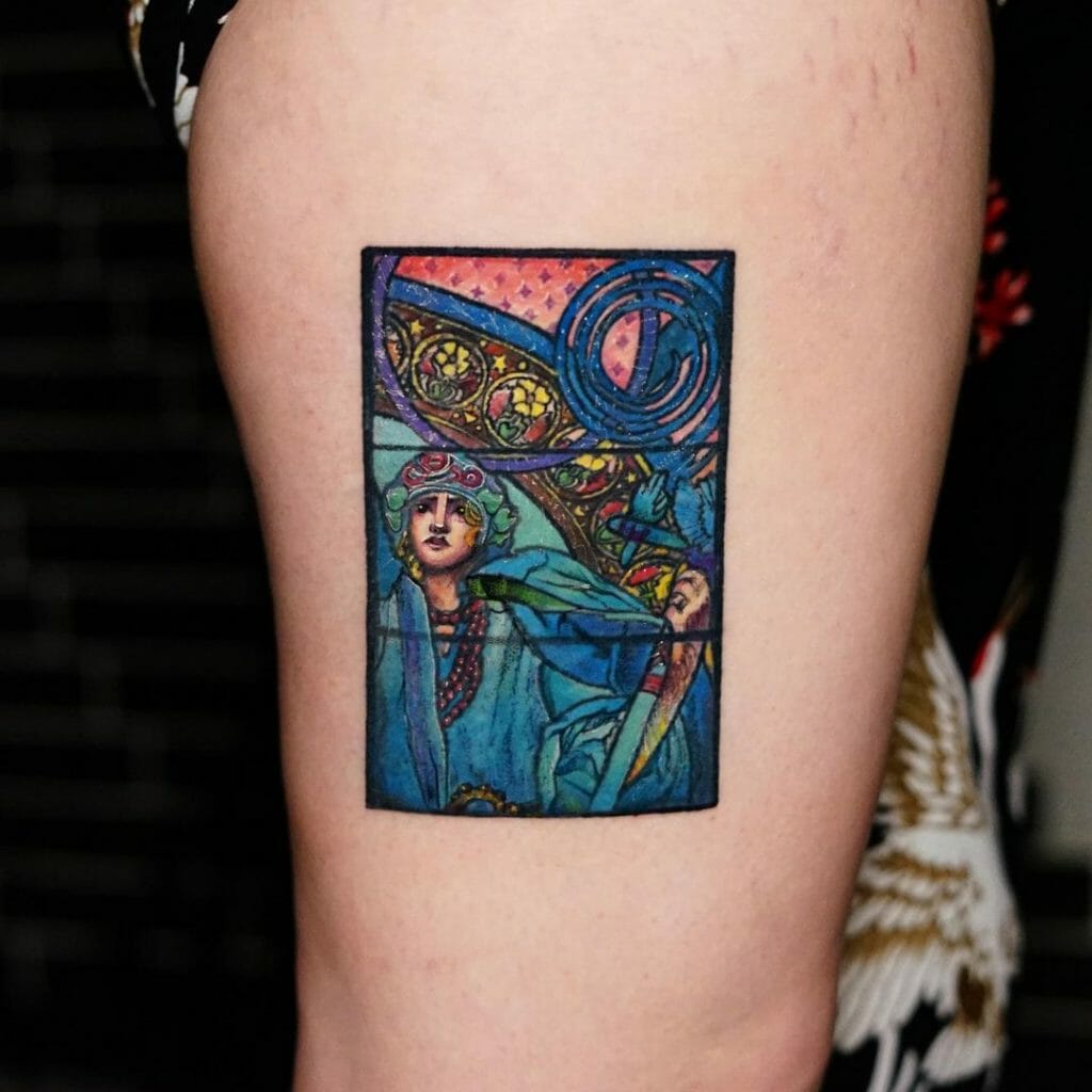 A tattoo of an actual stained glass window